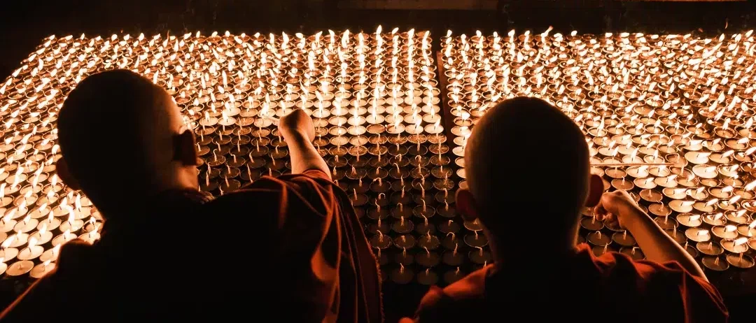 Buddhist monks lightning lamps
