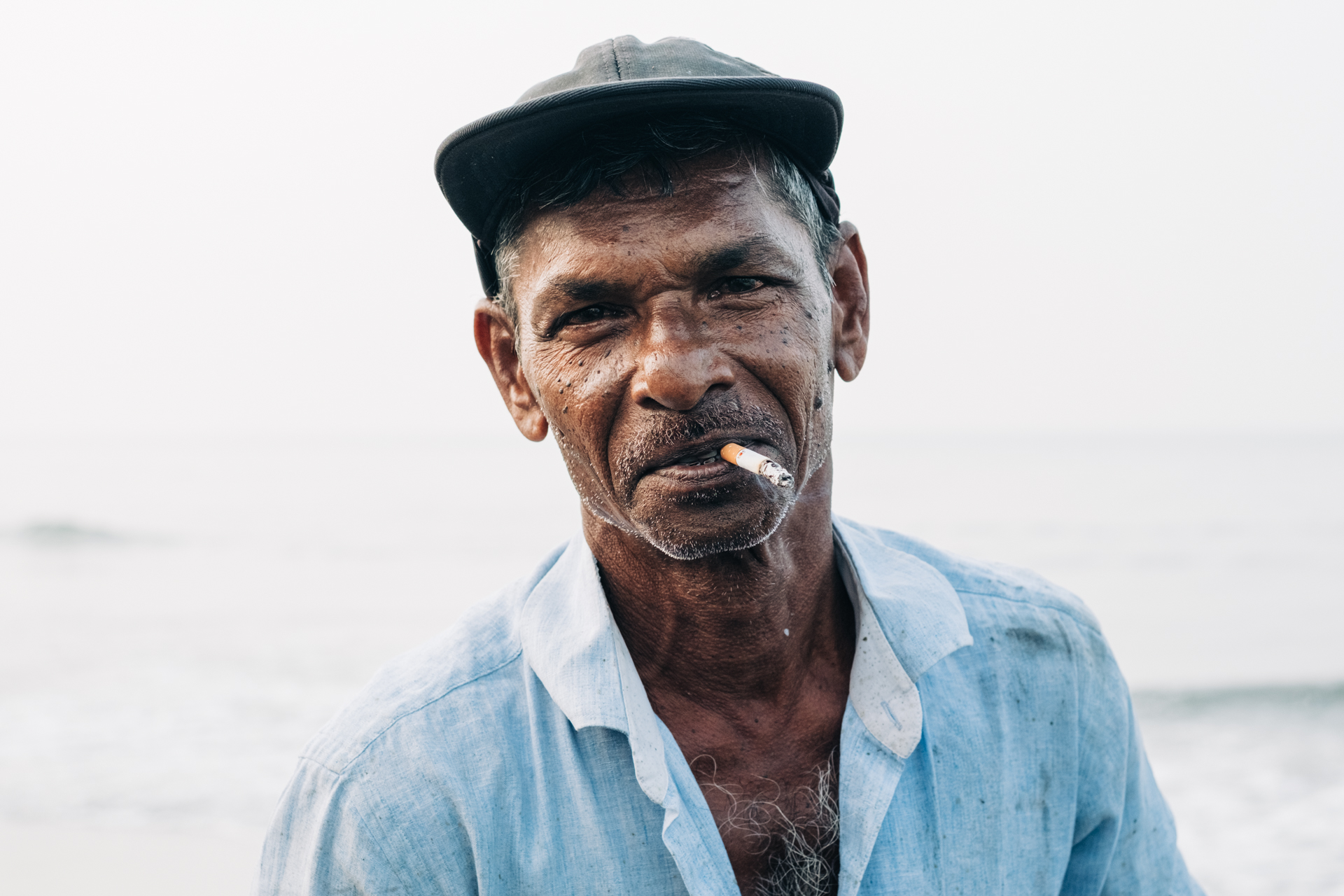 portrait of fisherman from fort kochi