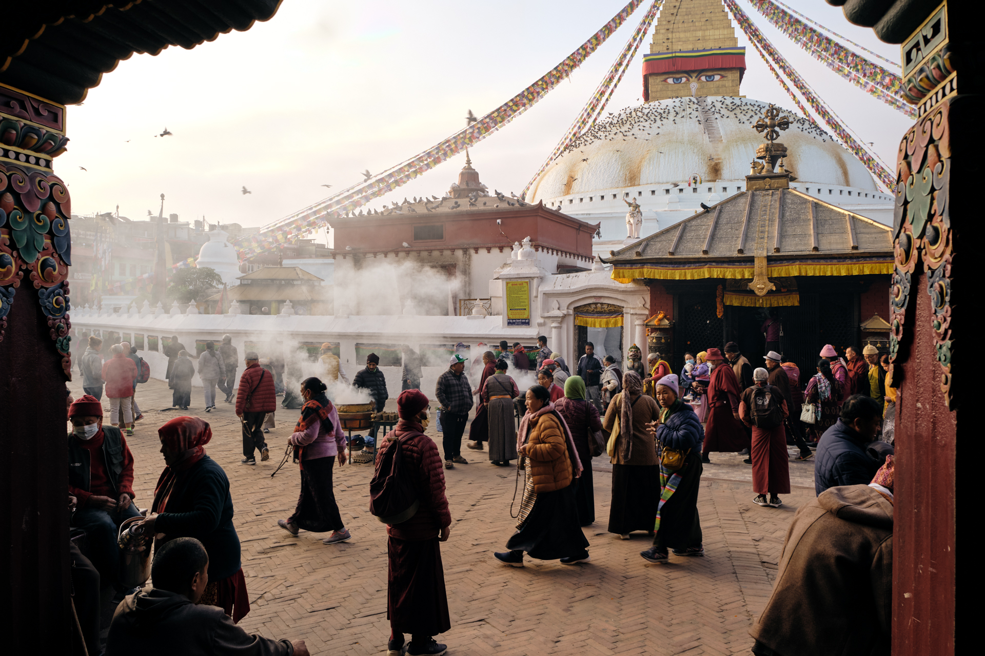 Pilgrims circle the towering Boudhanath Stupa in Kathmandu, nepal