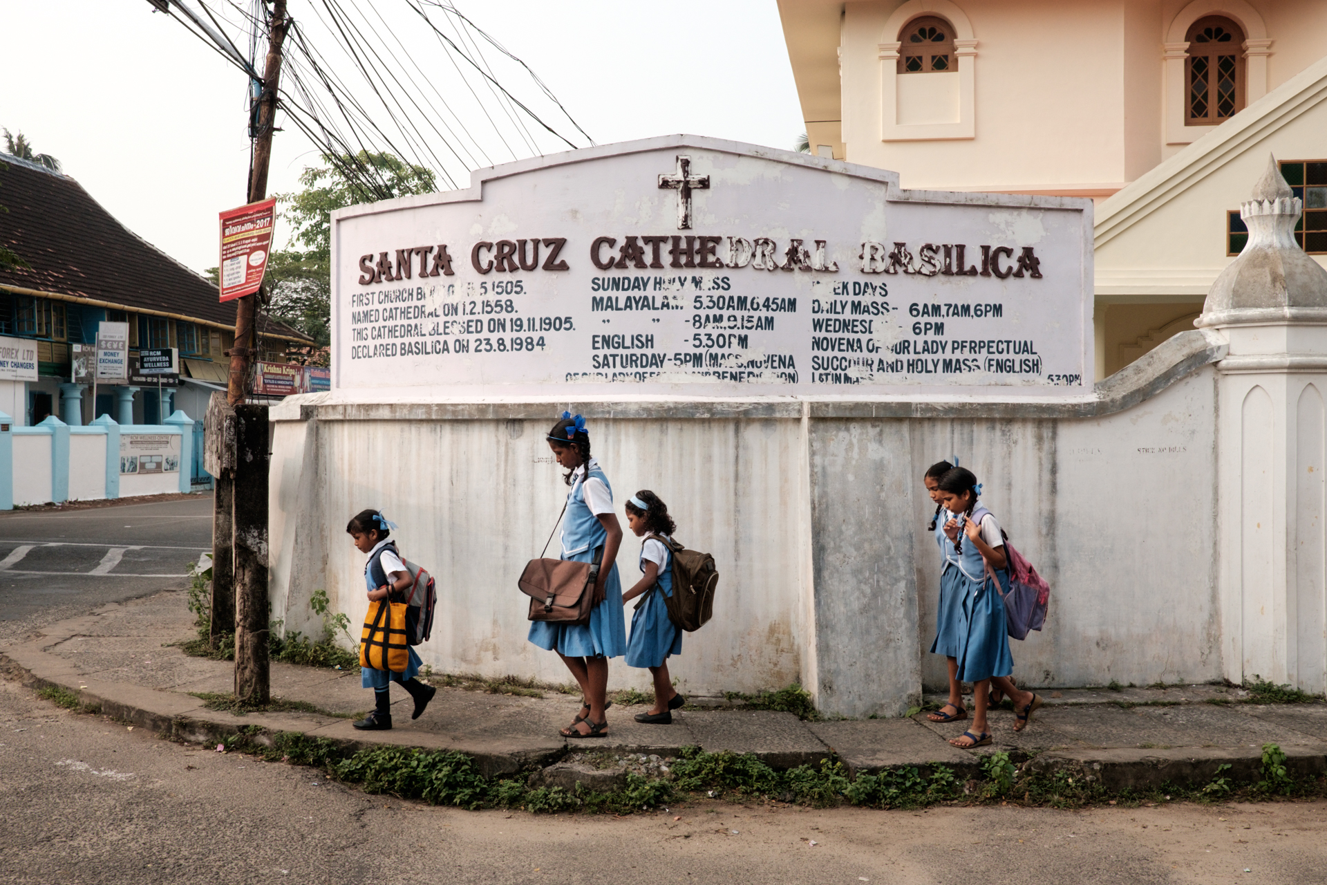 A group of children is going to school in Fort Kochi, Kerala