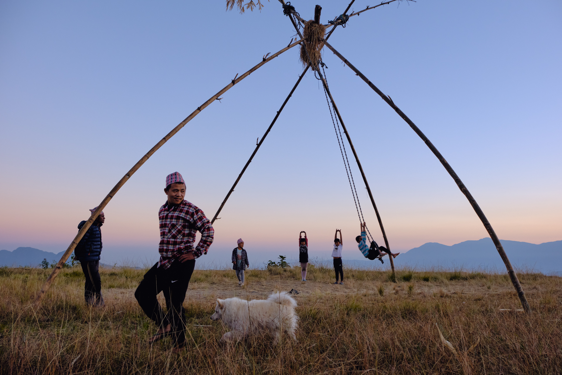 Swing made from bamboo poles during local festival in Dhampus – tradition captured on Nepal photo tour